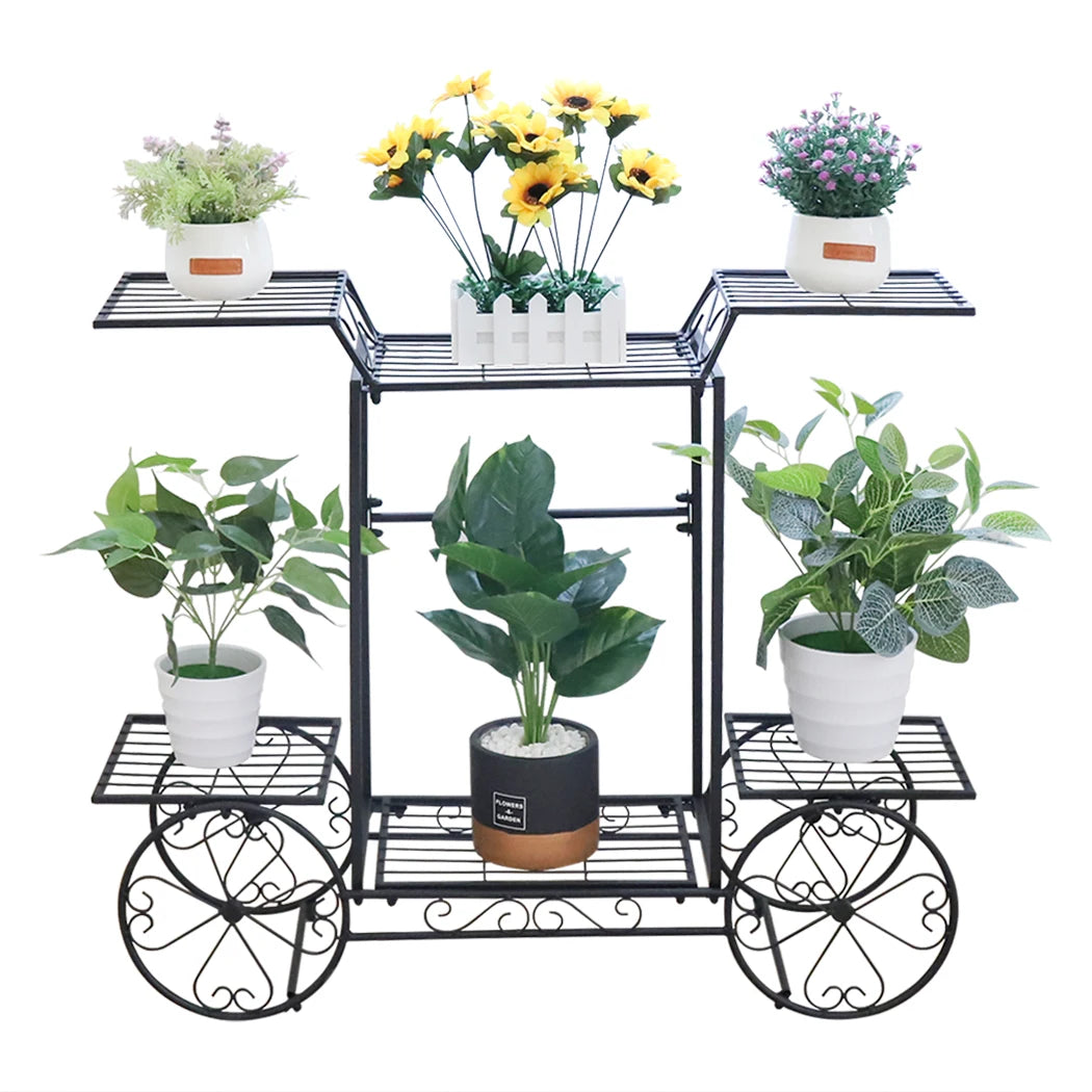 6 Tier Garden Cart Plant Holder with decorative sunflowers and foliage in white pots. Elegant black frame suits indoor and outdoor settings.
