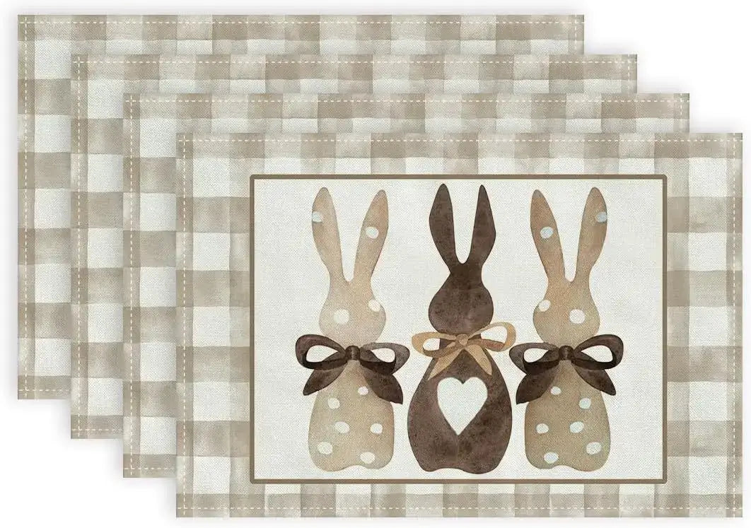 Rustic Easter placemats with three polka-dot bunnies and bows on a beige checkered background. Cozy and festive design.
