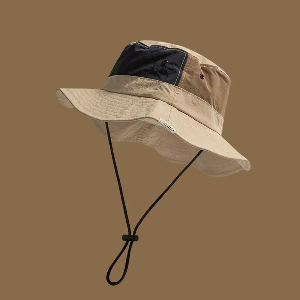 Beige and navy Sun Protection Bucket Hat - Quick-dry with wide brim and chin strap. Lightweight and foldable for outdoor adventures.