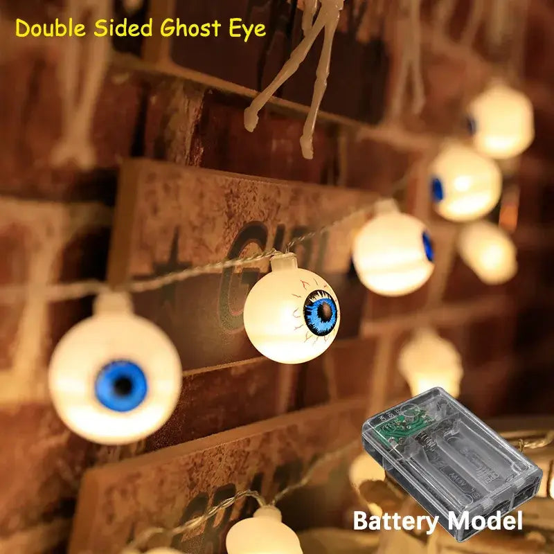 Double-sided ghost eye LED string lights with battery pack. Spooky Halloween lighting for walls or windows.