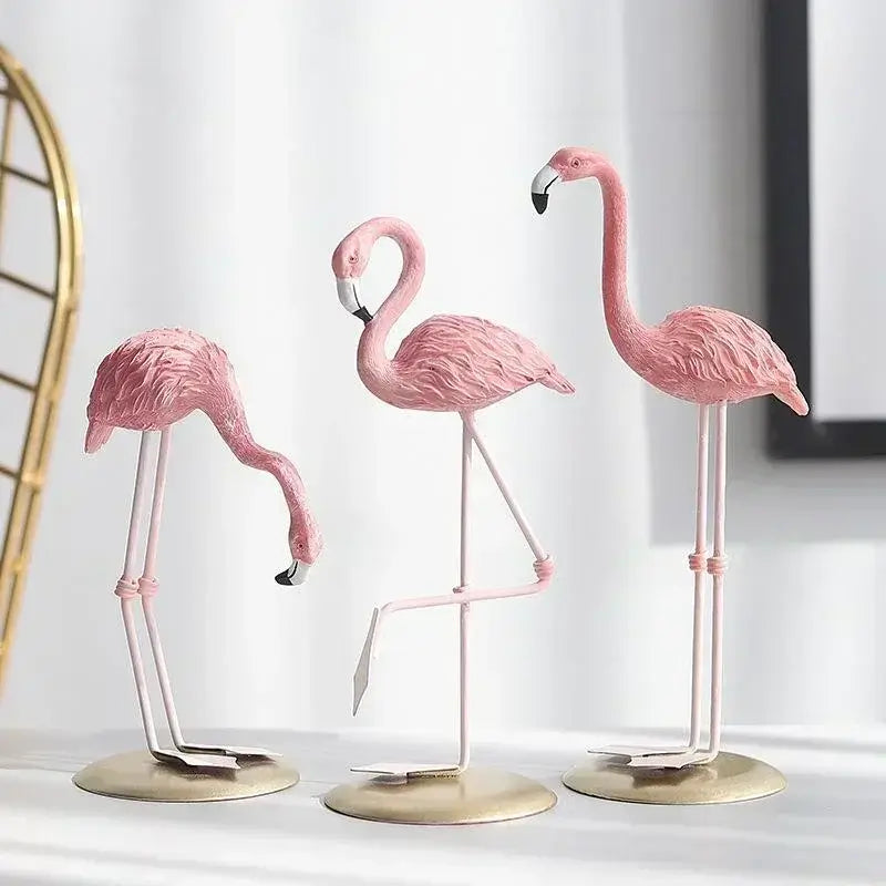 Creative Resin Flamingo Figurines in three poses on a tabletop, ideal for home or garden decor with a tropical theme.
