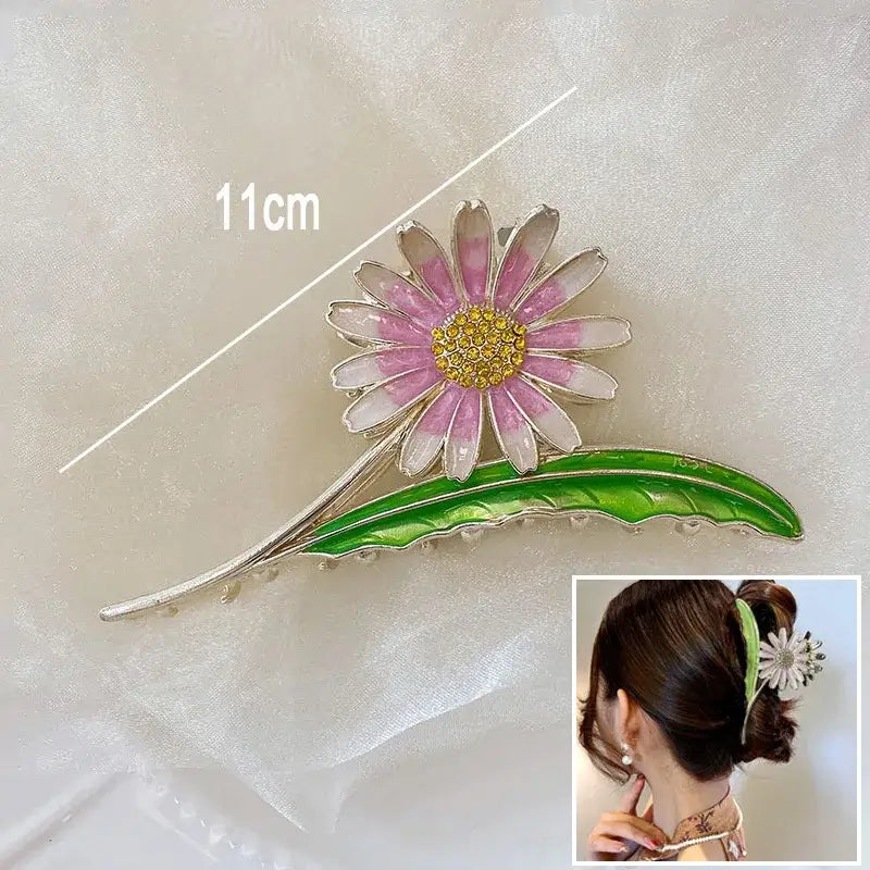 Purple daisy ponytail hair clip with green leaf, 11cm long, ideal for stylish and secure floral hairstyles.