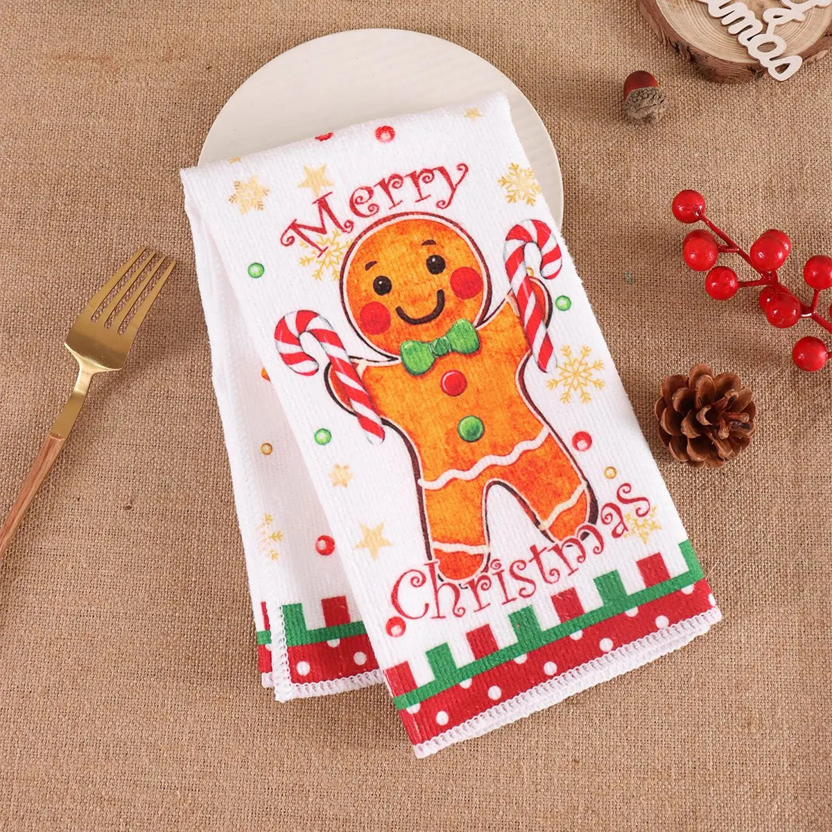 2pcs Christmas Kitchen Dishtowels featuring Gingerman designs and festive text, ideal for holiday kitchen décor.