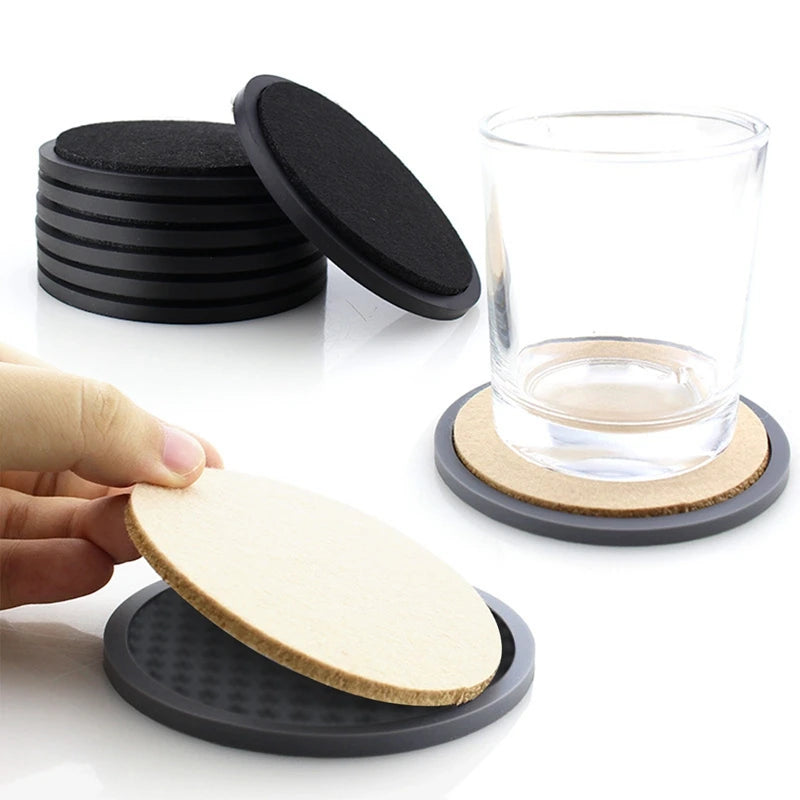 Non-slip 6Pcs Silicone Coasters Set with felt and cork inserts, ideal for protecting surfaces from hot or cold drinks in kitchen or dining settings.