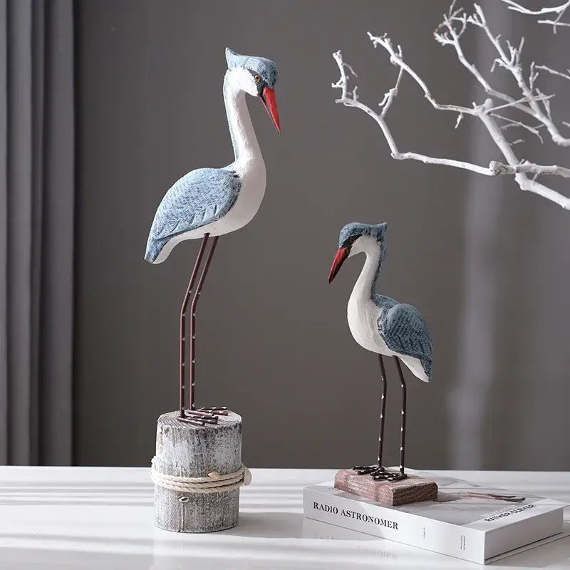 Mediterranean Resin Seagull Figurine set with blue and white finish, displayed on a table for coastal home decor styling.