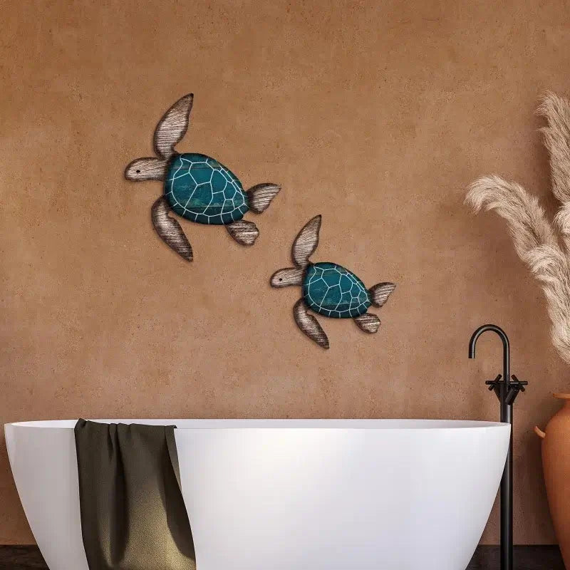 Wooden Turtle Wall Hanging Set - Coastal Decor | Handcrafted displayed above a white bathtub on a tan wall, ideal for beach-themed bathrooms.