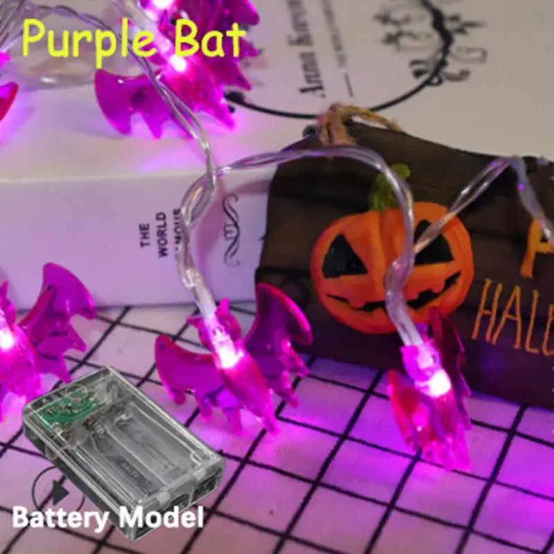 Purple bat LED string lights with battery model. Vibrant Halloween lighting for parties and themed rooms.