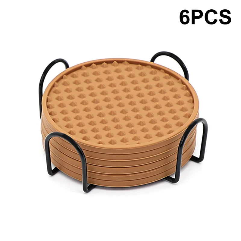 Brown 6Pcs Silicone Coasters Set with metal holder. Durable and stylish coasters ideal for protecting tables in any home or bar setting.