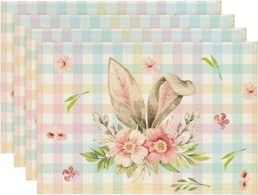 Pastel plaid Easter placemats with bunny ears and floral bouquet design. Adds a soft, festive touch to spring table decor.