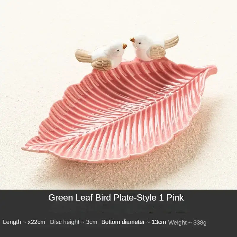 Pink ceramic leaf jewelry tray with bird figurines, Style 1 Pink, crafted for stylish vanity organization.