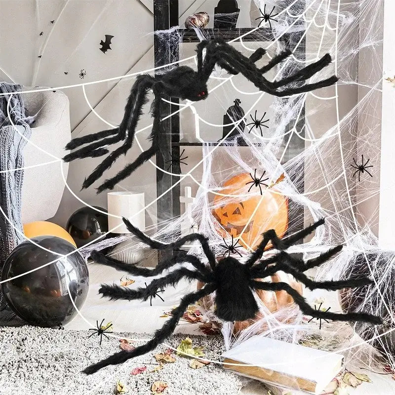 Indoor Halloween decor with Giant Black Spider Decorations in a web setup. Plush spiders with red eyes enhance spooky seasonal ambiance.