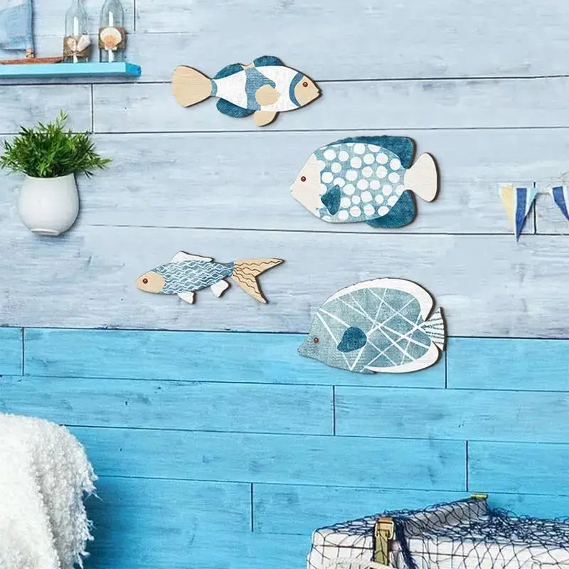 Wooden Nautical Fish Wall Sculpture set displayed on a blue-toned wall, enhancing a coastal-themed interior with marine-inspired artwork.