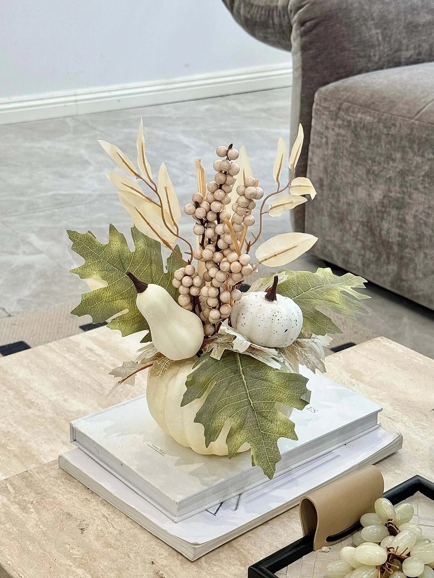 White 1pc Halloween Pumpkin Decor - Realistic polyester pumpkin with faux leaves and berries, styled on a coffee table for autumn home ambiance.