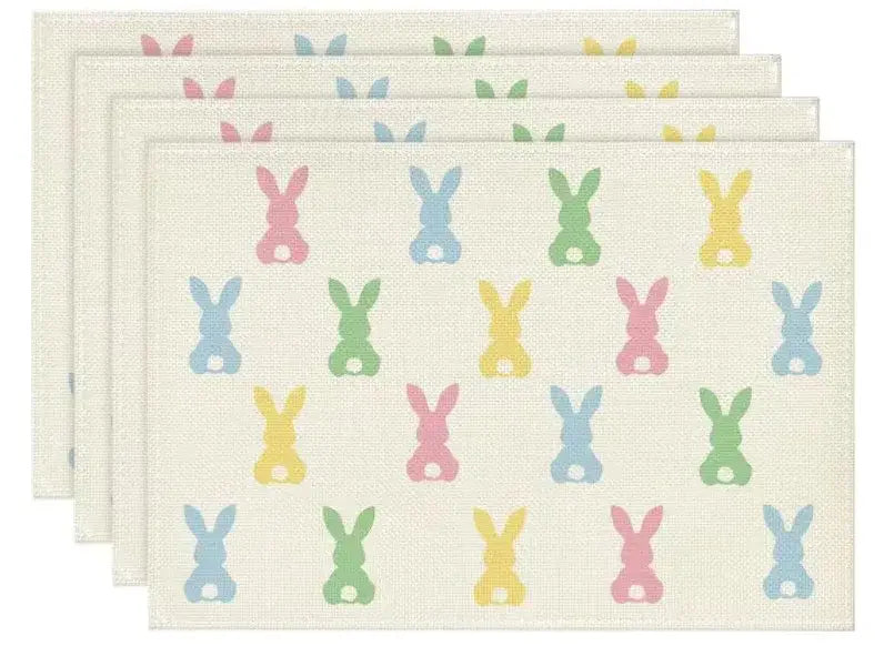 Minimalist Easter placemats with rows of pastel bunny silhouettes. Simple and colorful for modern spring tables.