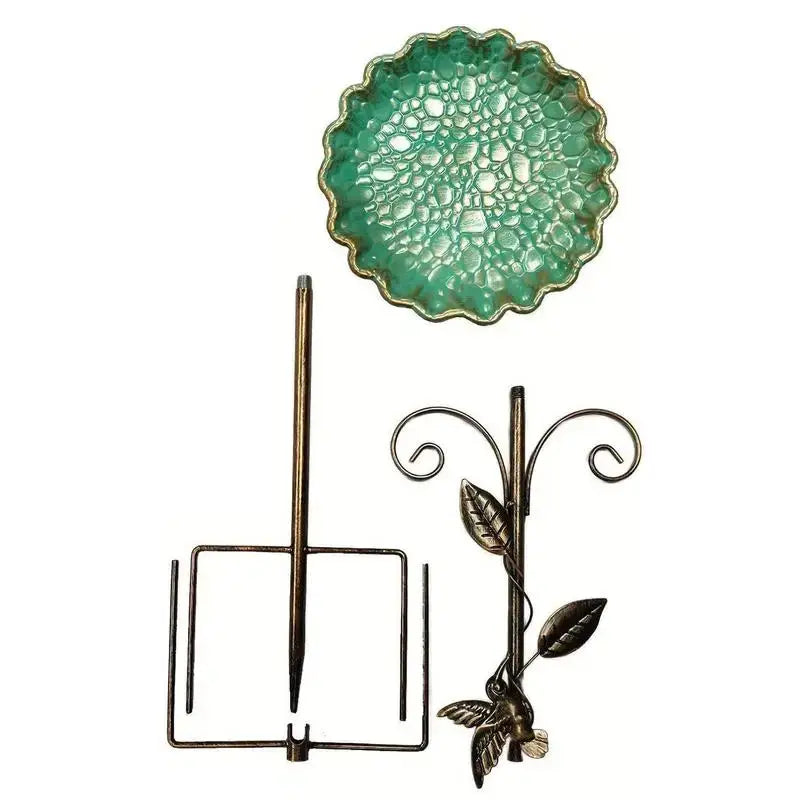 Disassembled Metal Bird Bath Feeder showing green bowl, bronze stand, and leaf-patterned support for easy setup.