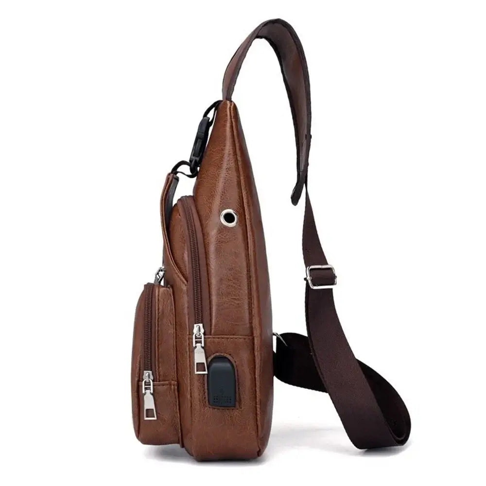 Travel Crossbody Bag - Multifunctional | Spacious and Versatile side view showing headphone jack and USB port, ideal for tech-savvy travelers.