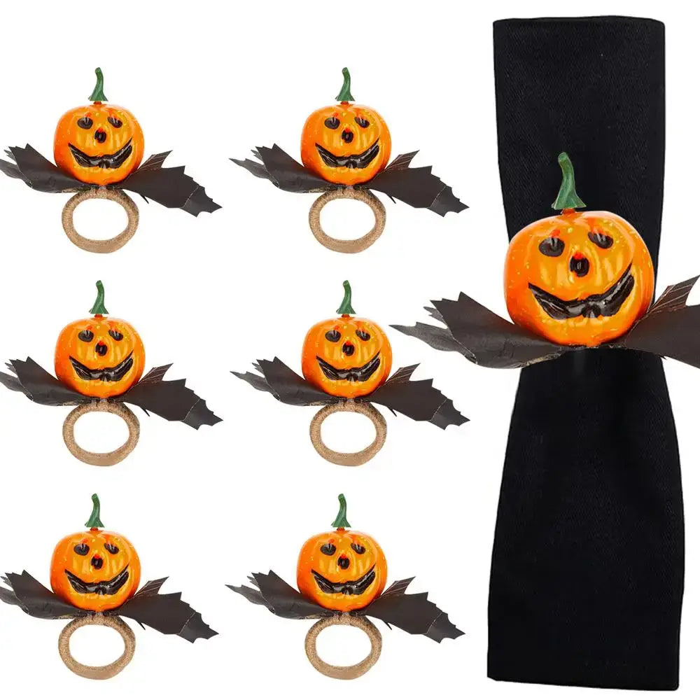 Halloween Pumpkin Napkin Rings Set of 6 with black leaves and smiling pumpkins, ideal for Halloween dinner table decoration.