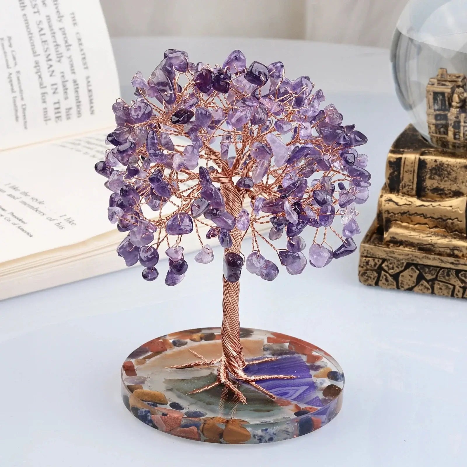 Amethyst crystal money tree with copper wire branches on a polished agate slice base. Ideal for energy healing and home decor.