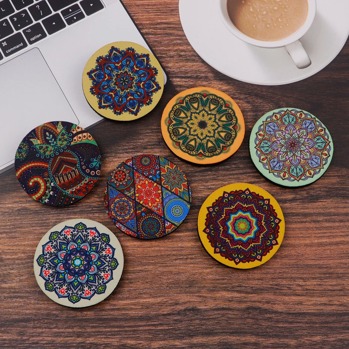Assorted 2pcs Vintage Mandala Car Cup Mats in vibrant colors on a wooden table, ideal for stylish vehicle decor and spill protection.