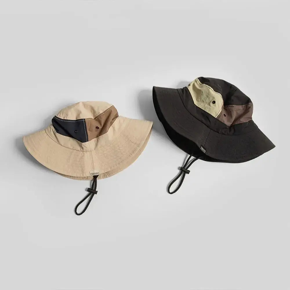 Two Sun Protection Bucket Hats - Quick-dry in beige and black color-block styles. Foldable and UV-resistant for outdoor use.