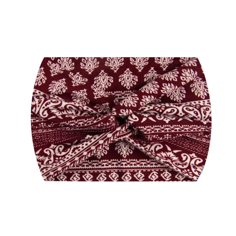 Burgundy paisley 18CM stretch printed headband with white patterns. Great for sports and fashion-forward outfits.