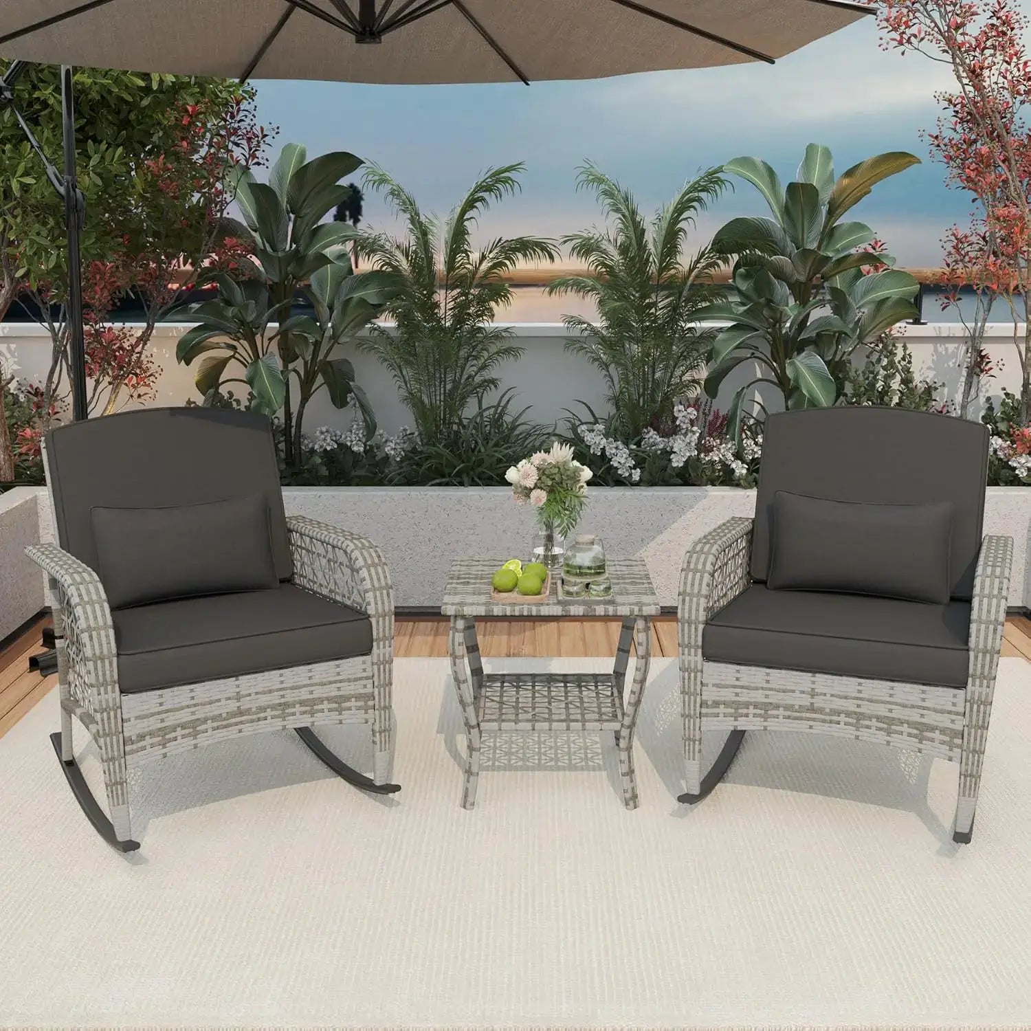 Dark gray cushion version of the 3-piece patio rocking chair set with rattan frame, styled on a modern outdoor patio.