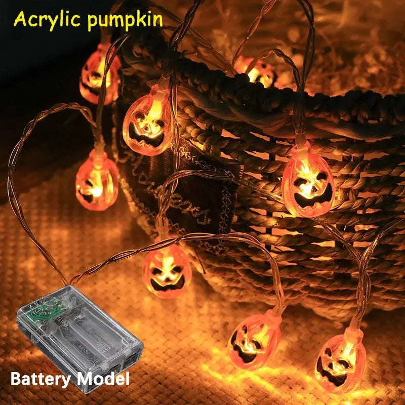 Acrylic pumpkin Halloween LED string lights with battery model. Glowing jack-o'-lanterns for festive ambiance.