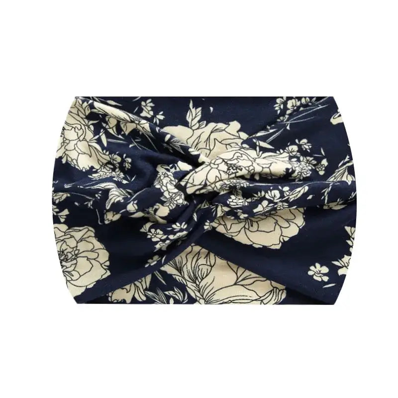 Navy blue floral 18CM stretch printed headband for women. Comfortable and stylish for workouts or casual wear.