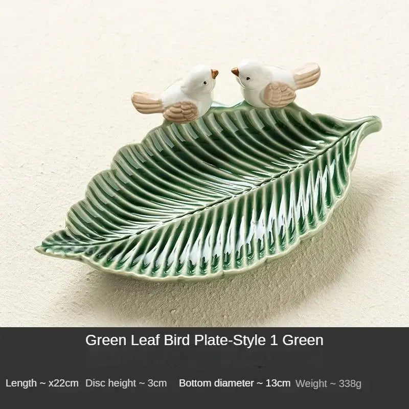 Green ceramic leaf jewelry tray with bird figurines, Style 1 Green, crafted for organizing rings and small accessories.
