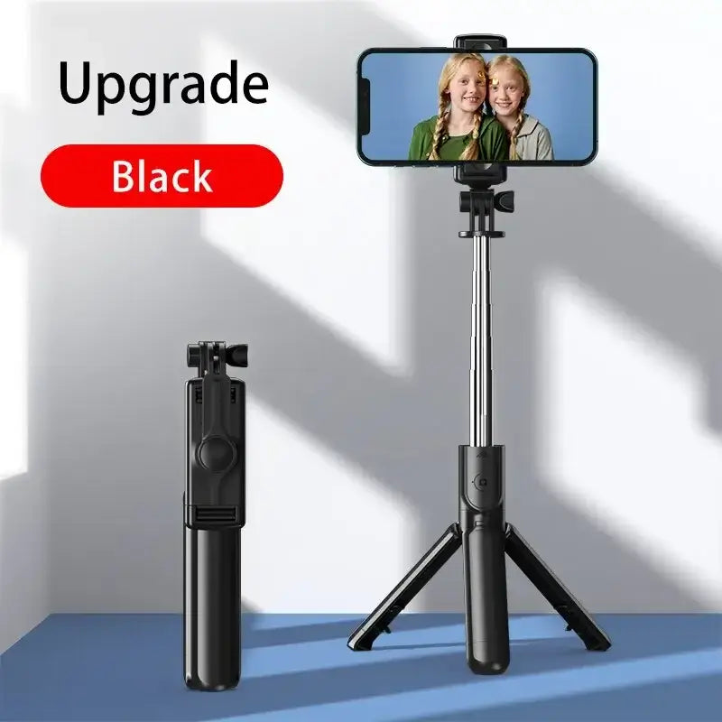 Upgraded black Bluetooth Selfie Stick Tripod with phone mounted, highlighting sleek design and adjustable height for selfies and videos.